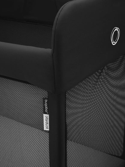 Bugaboo logo detail on the Stardust travel cot frame