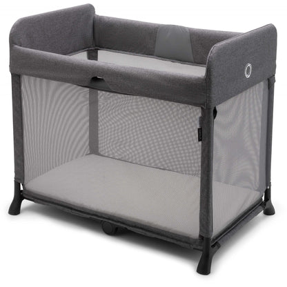 Bugaboo Stardust travel cot in grey melange, side view