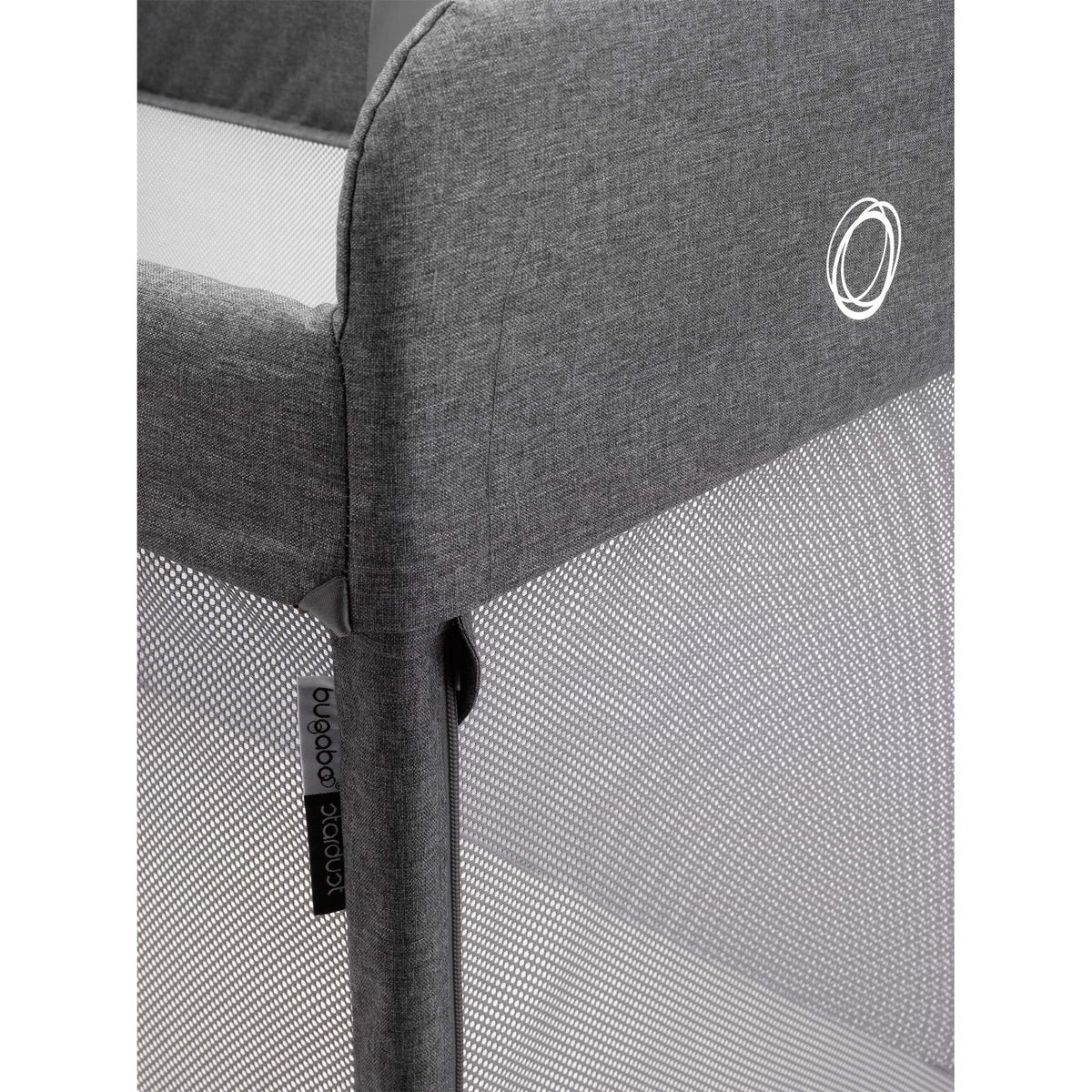 Close-up of the grey melange fabric on the Bugaboo Stardust travel cot