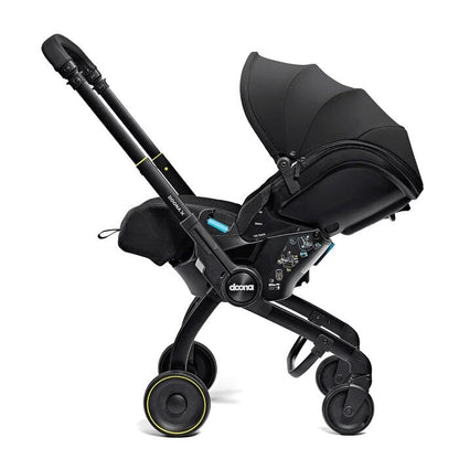 Doona X in stroller mode with the handlebar extended