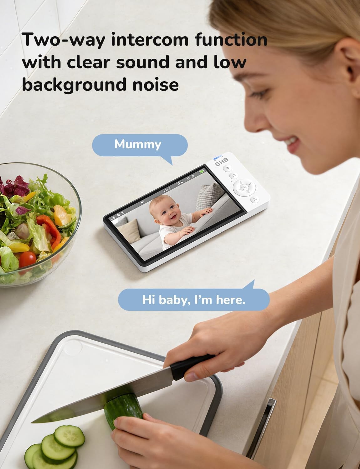 Parent using the two-way intercom on the GHB video baby monitor