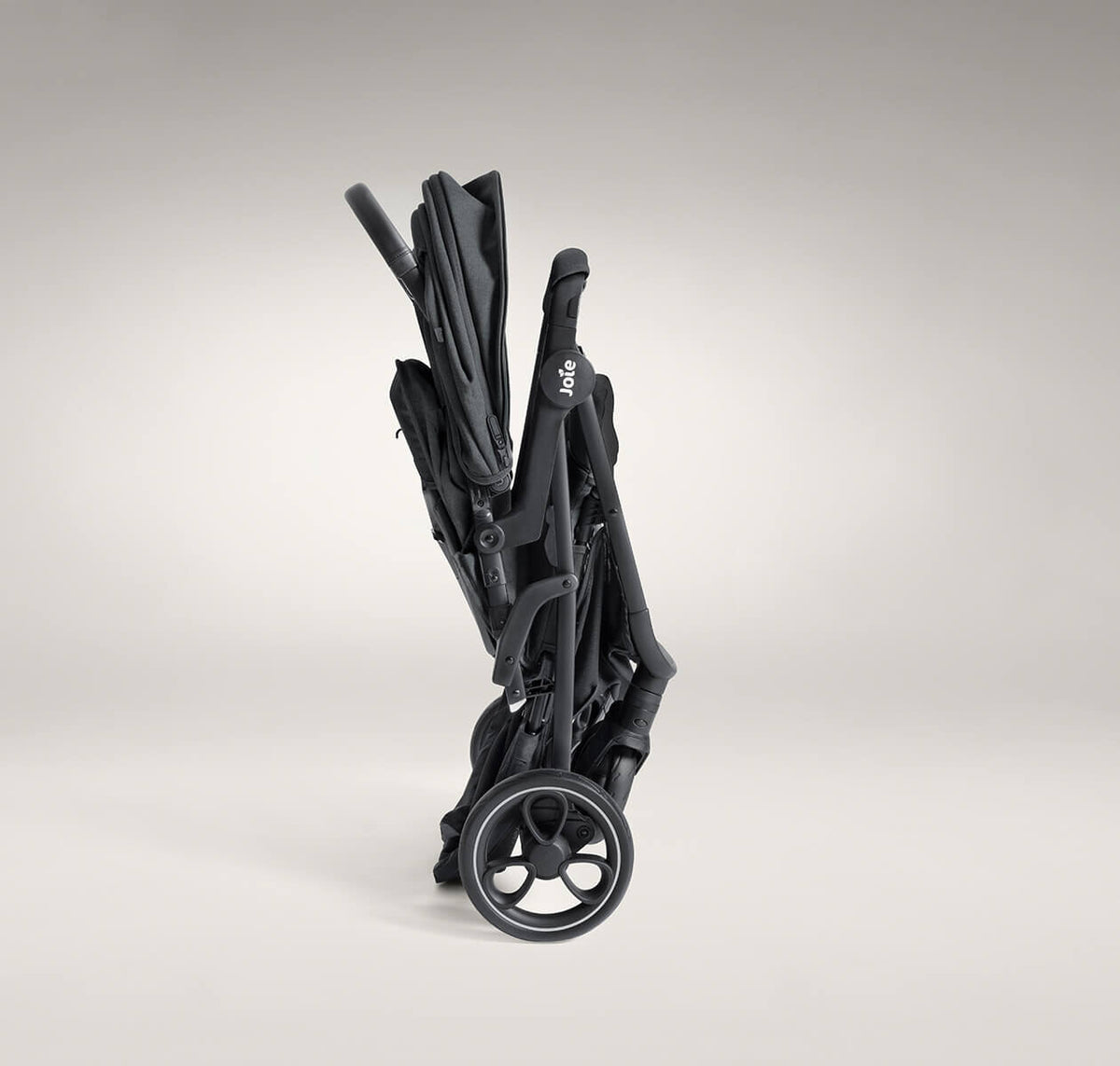 Joie Signature Estrella double stroller folded for storage