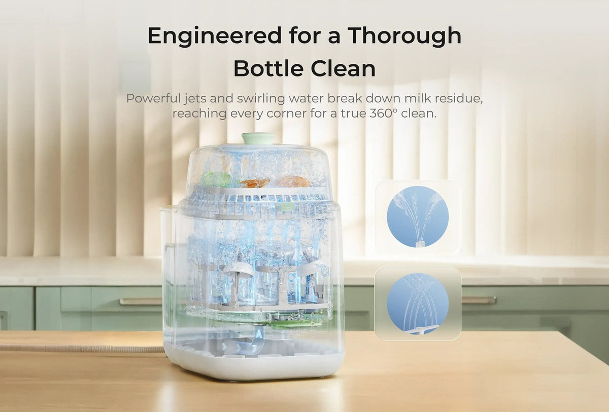Baby bottle being cleaned inside the Momcozy KleanPal Pro