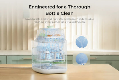 Baby bottle being cleaned inside the Momcozy KleanPal Pro