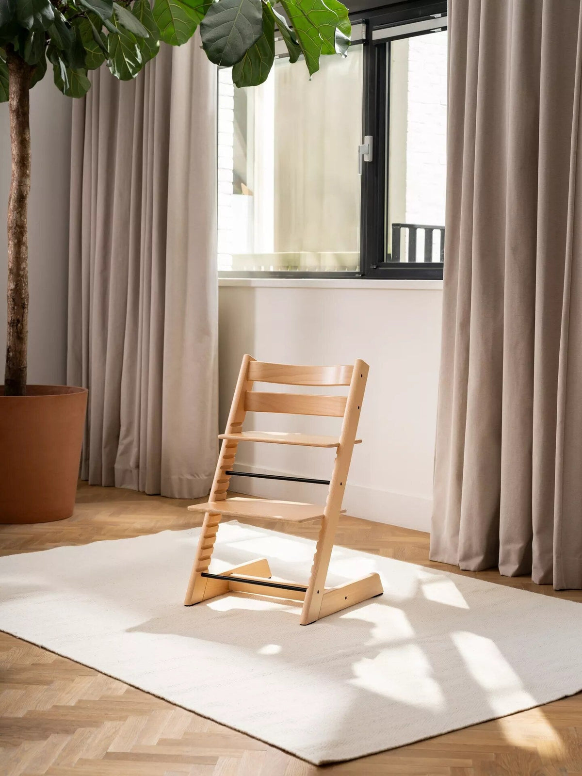 Stokke Tripp Trapp high chair in a bright living room